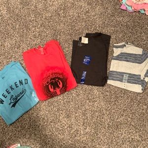 Four medium men’s causal T-Shirts